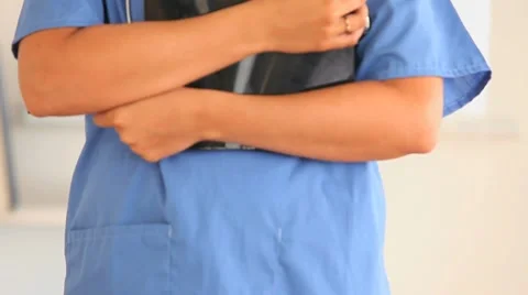 Smiling doctor posing Vidéo 7763326