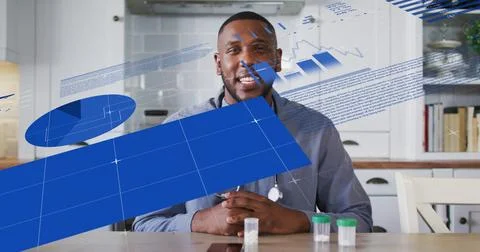 Smiling doctor sitting at kitchen table, reviewing data charts with stethoscope Foto stock