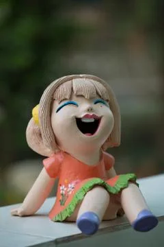 Smiling doll Stock Photos
