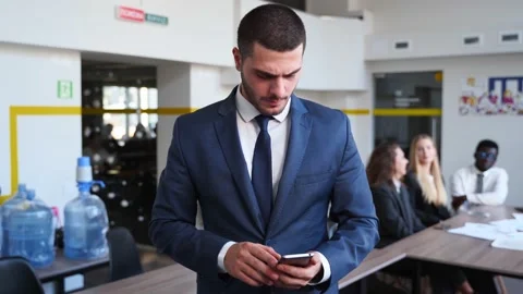 Smiling eastern arab businessman using mobile phone, typing text messages Stock Footage 205127163