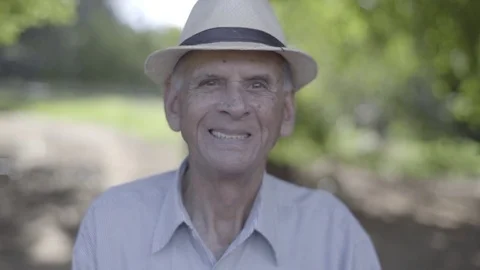 Smiling Elderly Farmer Looking At The Camera In Nature Stock Footage 85078874