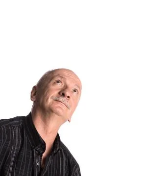 Smiling elderly man looking up 写真素材
