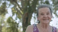 Smiling Elderly Woman Looking At Camera Stock Footage