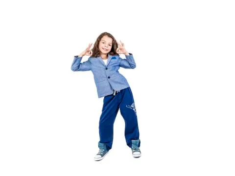Smiling elemental 7 year old boy thumbs up, isolated on white Stock Photos