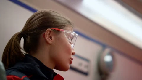 Smiling EMS paramedic having conversation with colleague in emergency car Stock Footage 166877950