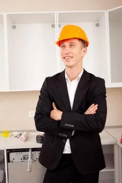 Smiling engineer in the interior Stock Photos