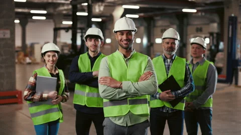 Smiling Face Diverse Team of Machine Technicians in Safety Uniform Standing with Stock Footage 249126937