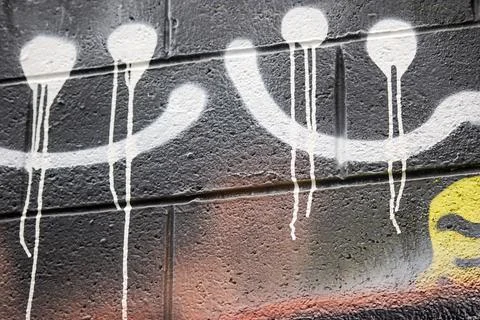 Smiling face graffiti Stock Photos
