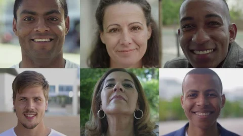 Smiling faces of happy people looking at camera. Video stock 114276160