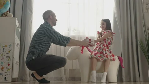 Smiling father having fun with cute child at home Stock Footage 157232730
