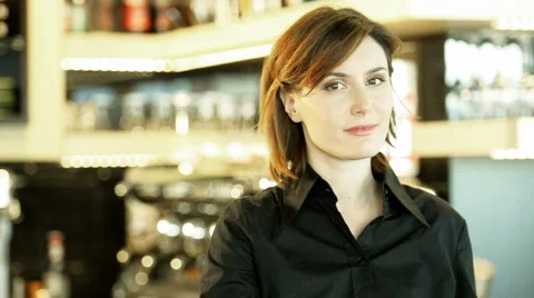 Smiling Female Bar Tender Stock Footage 1078401