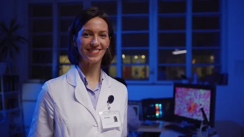 Smiling female chemist posing in laboratory Stock Footage 124715912