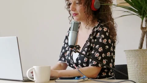 Smiling Female Content Creator Recording Podcats Stock Footage 150894642