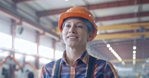 Smiling Female Factory Laborer Going to Work Stock Footage