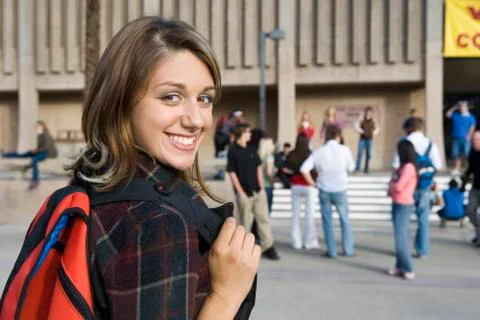 Smiling Female Student On College Campus Stock Photos