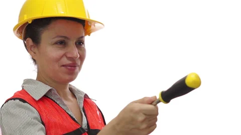 Smiling Female Worker Passing a Screwdriver Stock Footage 42528733