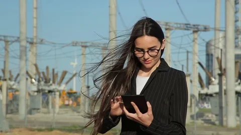 Smiling female worker at power plant Stock Footage