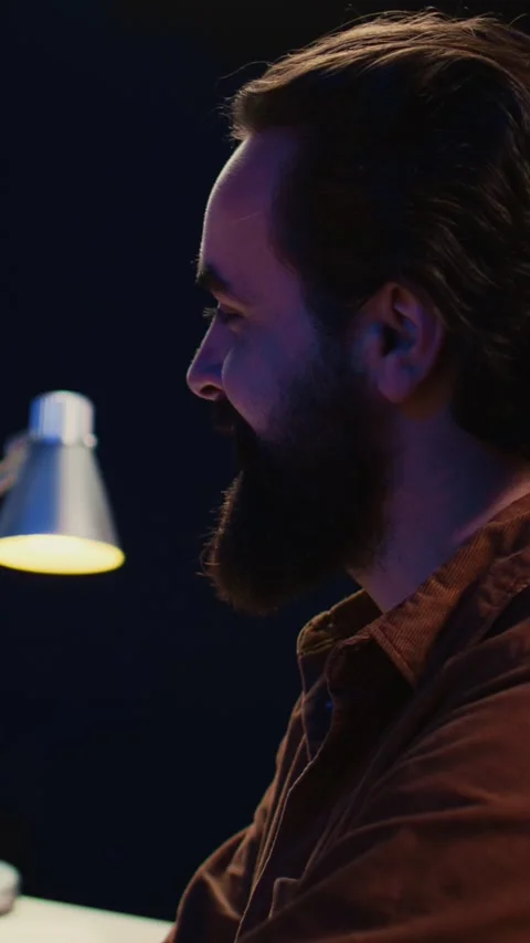 Smiling freelancing developer in home office doing coding on computer Stock Footage 264511361