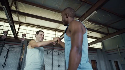 Smiling friends high five at gym Stock Footage 71619725