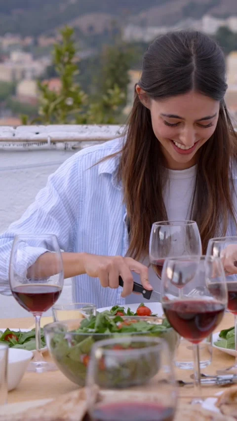 Smiling gathering of ethnically diverse young people on rooftop barbecue. Happy Stock Footage 273950954