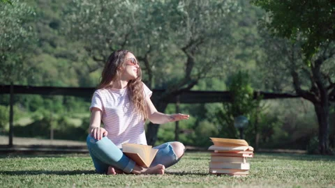 Smiling girl dancing doing hands motions. Self-education and relax outdoors Stock Footage 136661580
