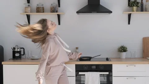 Smiling girl using smartphone browsing the internet enjoying modern lifestyle. Stock Footage 107872835