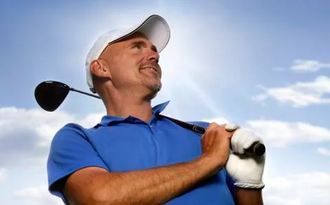 Smiling golfer Stock Photos