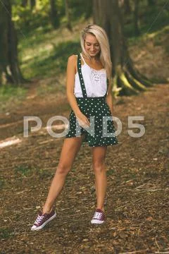Smiling gorgeous blonde standing Stock Photos
