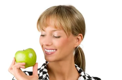 Smiling at green apple Stock Photos