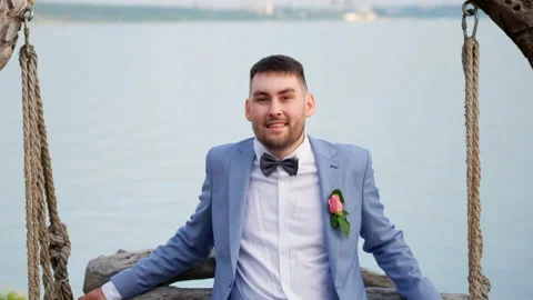 Smiling groom in wedding bow tie swing looking at camera. Suit happy people. Stock Footage 159755592