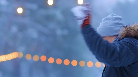 Smiling guy and girlfriend play snowballs on ice rink Stock-Footage 134144068