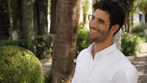 Smiling guy in glasses 스톡 동영상 89560433