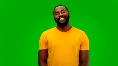 Smiling guy points his thumb to the right. Alpha channel Stock Footage 117538561