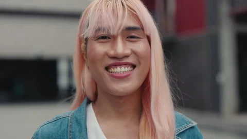 Smiling Guy Standing and Looking at the Camera Stylishly Dressed and with Make Stock Footage 311105277