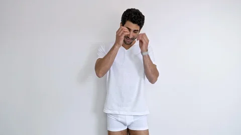 Smiling guy in underwear Stock Footage 89520135