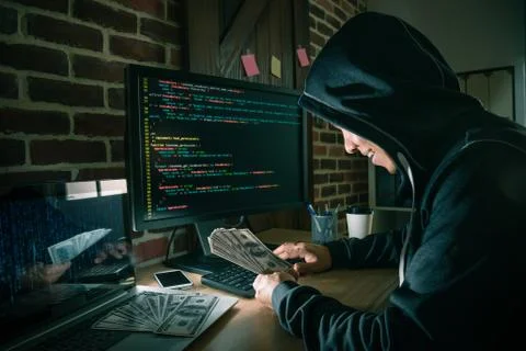 Smiling hacker man using code program system 스톡 사진