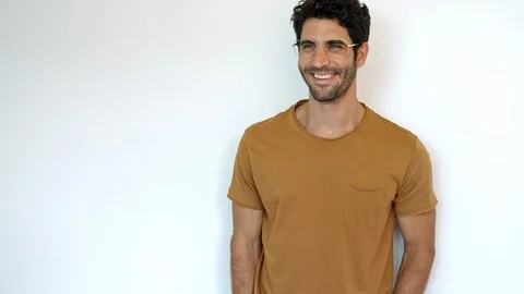 Smiling handsome guy Stock Footage 89476015