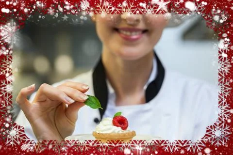 Smiling head chef putting mint leaf on little cake on plate Stock Illustration