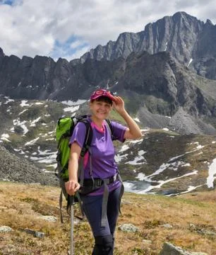 Smiling hiker with a backpack Stock Photos