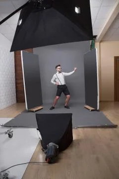 Smiling hipster man in studio Stock Photos