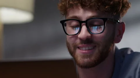 Smiling Hipster Man Talking Witn Person. Male Student Talking With Friend Using Stock Footage 165070531