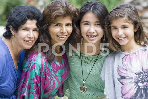 Smiling Hispanic family Stock Photos