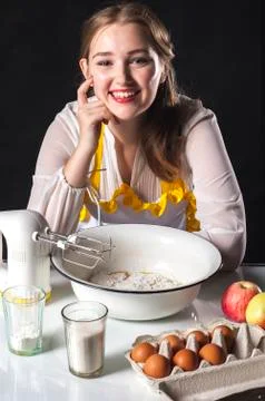 Smiling homemaker in kitchen Foto stock