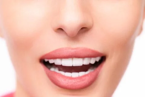 Smiling human face with perfect teeth Stock Photos
