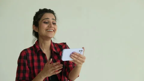 Smiling Indian female using video call phone calling. Stock Footage 197020077