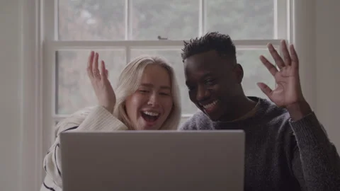 Smiling Interracial Couple Waving Hello Over Video Chat Stock Footage 270403902