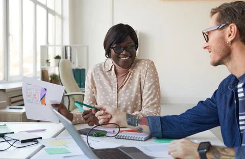 Smiling IT Developers Designing Web Applications Foto stock