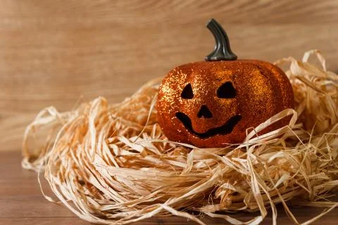 Smiling jack o lantern in shape of pumpkin Stock Photos
