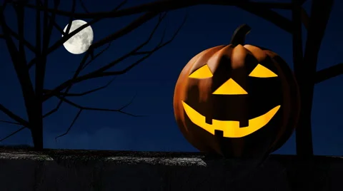 A Smiling Jack O Lantern under a full moon Stock Footage 41361051