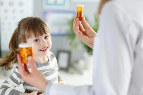 Smiling kid having doctors appointment Stock Photos